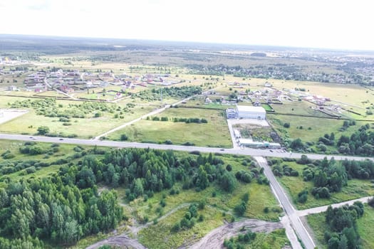 Top view of the village, fields and forests near the village