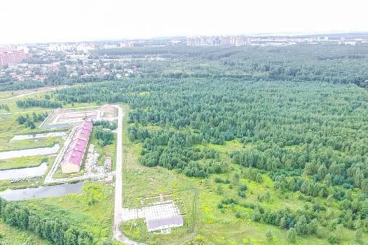 Top view of the village, fields and forests near the village