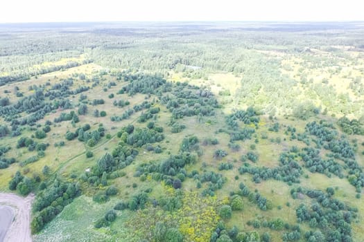 Top view of the village, fields and forests near the village
