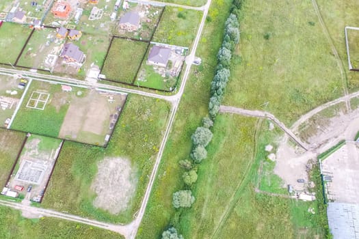 Top view of the village, fields and forests near the village
