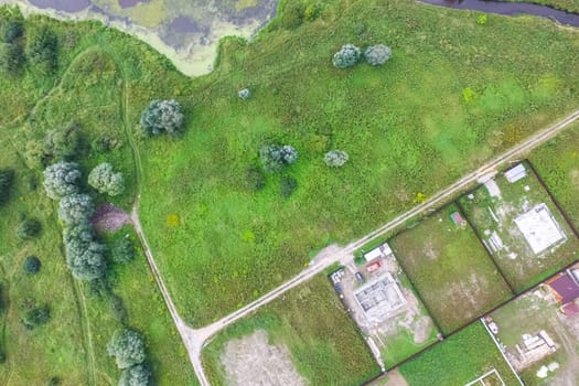 Top view of the village, fields and forests near the village