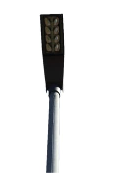 A rectangular street lamp, blue sky in the background