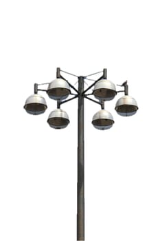 Street light with six lamps, and blue sky in the background