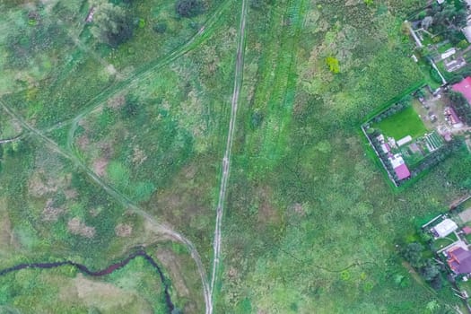 Top view of the village, fields and forests near the village