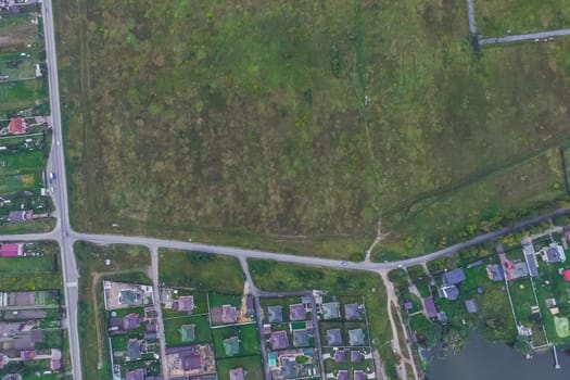 Top view of the village, fields and forests near the village