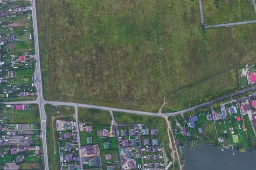 Top view of the village, fields and forests near the village