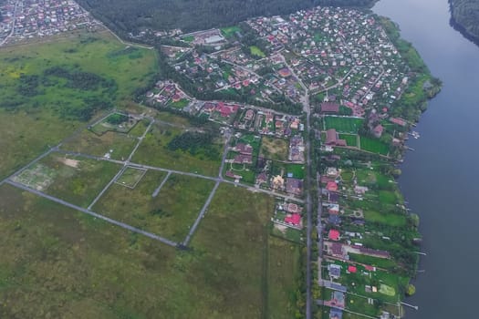 Top view of the village, fields and forests near the village