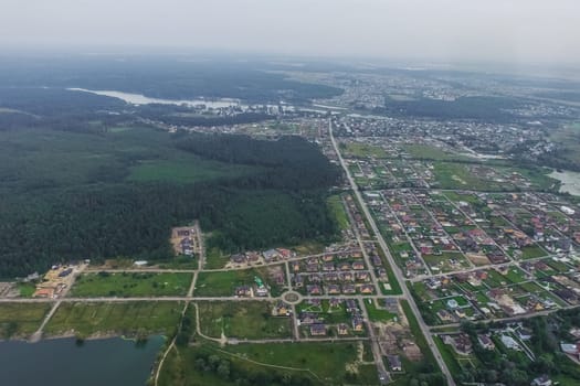 Top view of the village, fields and forests near the village