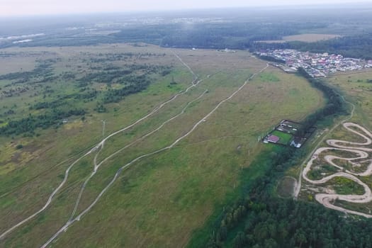 Top view of the village, fields and forests near the village