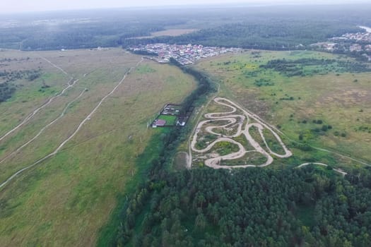 Top view of the village, fields and forests near the village