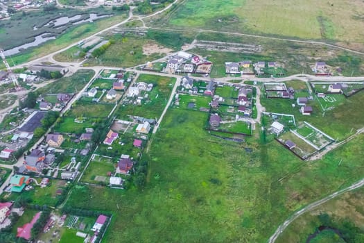 Top view of the village, fields and forests near the village