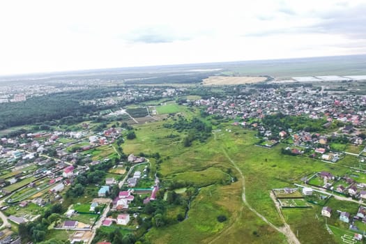 Top view of the village, fields and forests near the village