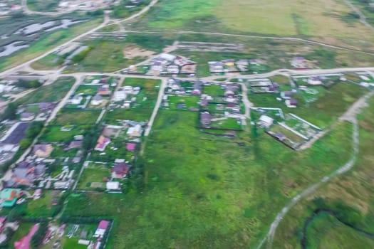 Top view of the village, fields and forests near the village