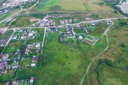 Top view of the village, fields and forests near the village