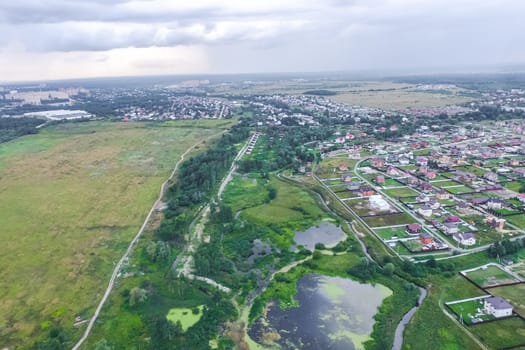 Top view of the village, fields and forests near the village