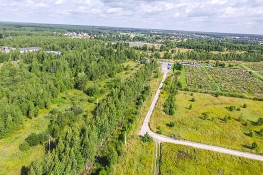 Top view of the village, fields and forests near the village