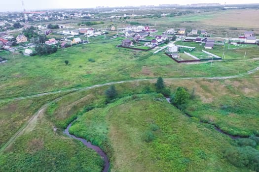 Top view of the village, fields and forests near the village