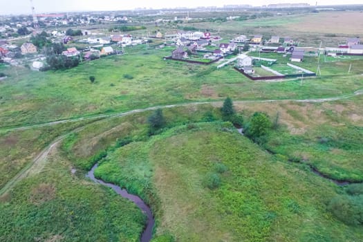 Top view of the village, fields and forests near the village