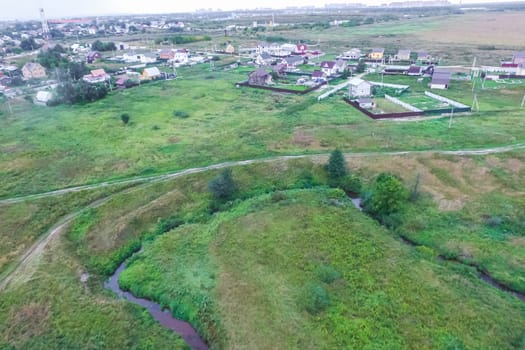Top view of the village, fields and forests near the village