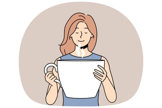 Woman inhales aroma of invigorating coffee and holds huge mug of drink for morning awakening. Girl with large portion of drink makes coffee break to gain strength for productive work.