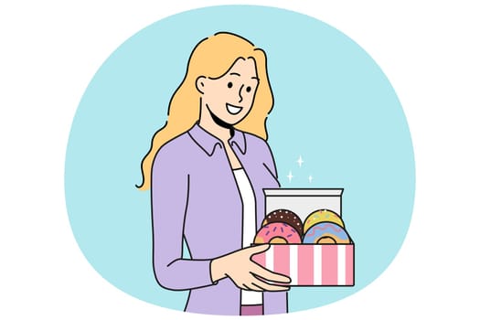 Woman holds donuts in box offering breakfast with sweet pastries with fruit or chocolate icing. Happy girl with donuts for kids party with desserts delivered from patisserie or bought in coffee shop