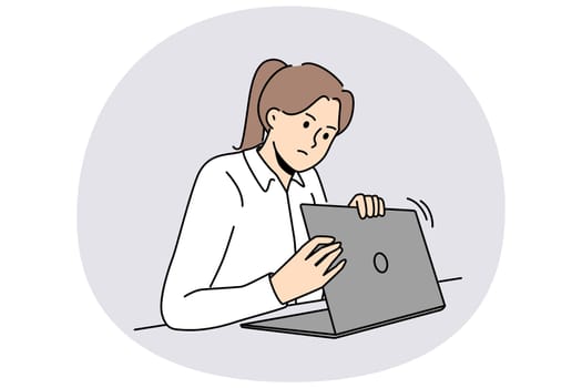 Woman is worried about privacy of data on internet and hides laptop screen while entering password. Taking care of security using internet and maintaining confidentiality to avoid information leakage