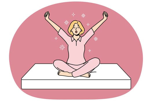 Woman sits on soft mattress and yawns getting ready for healthy sleep furniture concept. Girl in pajamas wakes up with good mood using orthopedic mattress for comfortable night rest