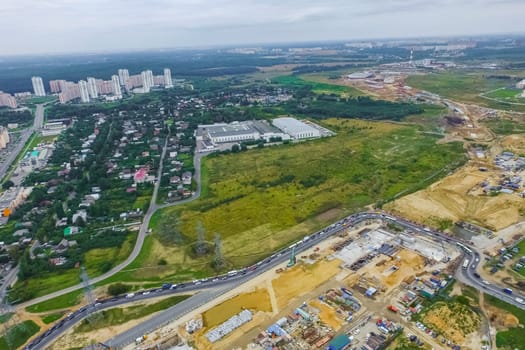 Top view of the city of Moscow, buildings and roads and other infrastructure of the city. Cityscape view from above.