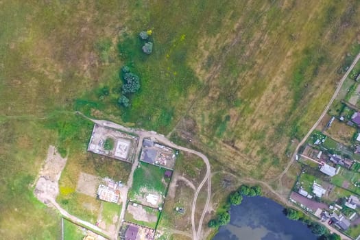 Top view of the village, fields and forests near the village