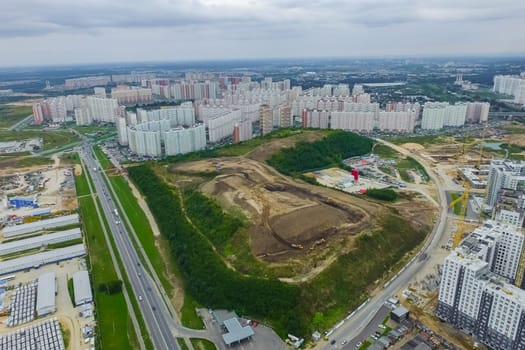 Top view of the city of Moscow, buildings and roads and other infrastructure of the city. Cityscape view from above.