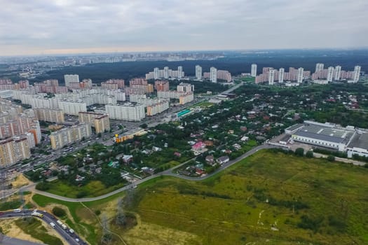 Top view of the city of Moscow, buildings and roads and other infrastructure of the city. Cityscape view from above.