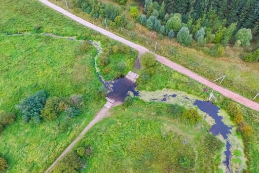 Top view of the village, fields and forests near the village