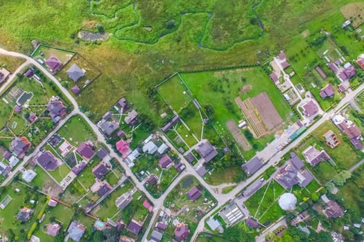 Top view of the village, fields and forests near the village