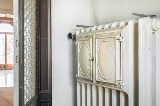 Antique cast iron radiator (1900s Italian) with food warmer