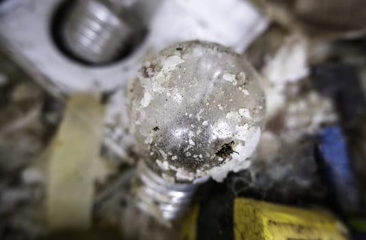 Detail of broken and damaged light bulbs, recycling
