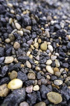 Detail of wet boulders on a cold rainy day