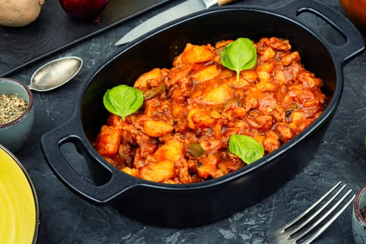 Stewed potatoes with minced turkey. German cuisine. Copy space.