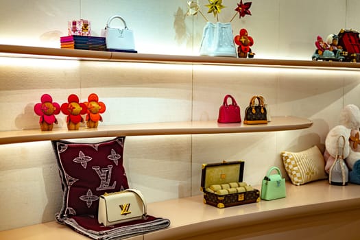 SINGAPORE - MAY 10, 2024: Products display in Louis Vuitton fashion house at Marina Bay Sands shopping mall in Singapore