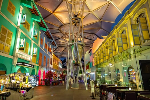 SINGAPORE - MAY 12, 2024: Clarke Quay after sunset, popular nightlife district of Singapore