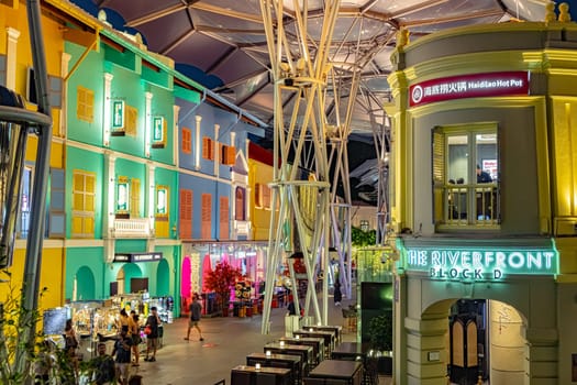 SINGAPORE - MAY 12, 2024: Clarke Quay after sunset, popular nightlife district of Singapore