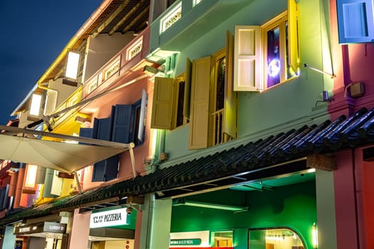 SINGAPORE - MAY 12, 2024: Clarke Quay after sunset, popular nightlife district of Singapore