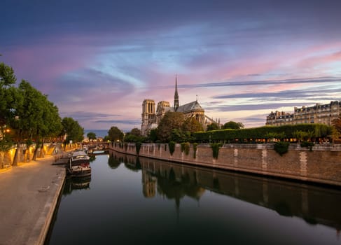 Notre Dame and park on river Seine in Paris, France
