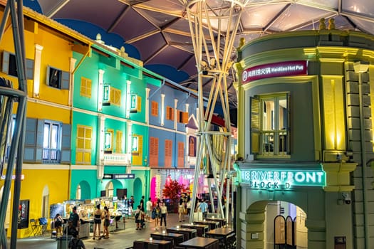 SINGAPORE - MAY 12, 2024: Clarke Quay after sunset, popular nightlife district of Singapore