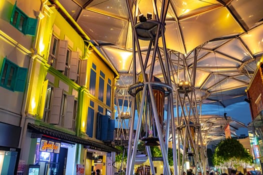 SINGAPORE - MAY 12, 2024: Clarke Quay after sunset, popular nightlife district of Singapore