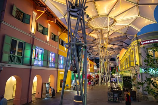 SINGAPORE - MAY 12, 2024: Clarke Quay after sunset, popular nightlife district of Singapore
