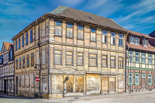 Broken down looking building just before it will get restored. Renovation about to start on old country house.