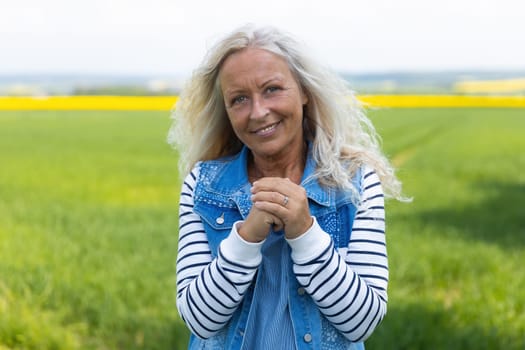 Portrait from happy caucasian woman with long hair