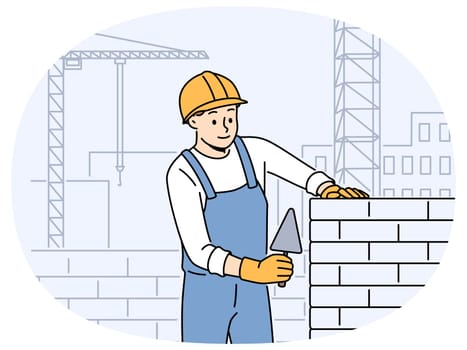 Positive male worker in uniform and helmet building house with bricks. Smiling man engineer busy laying blocks at construction site. Vector illustration.