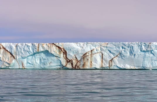 Glacial Face Extending into the Ocean on the shores of Nordaustlandet in the Svalbard Islands