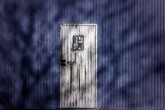 Detail of old metal door outside, protection and security